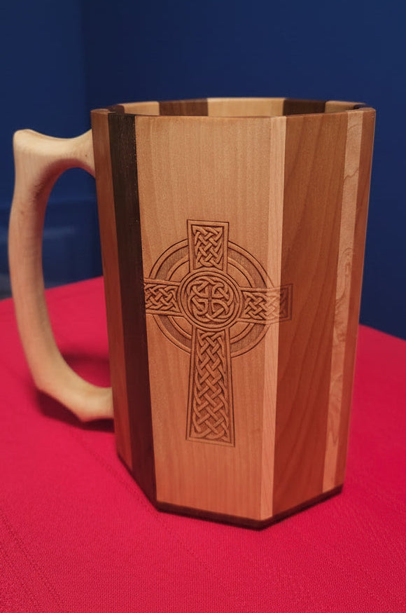 Wooden Jouster tankard with laser-engraved Celtic cross, two-tone maple and walnut construction, front view